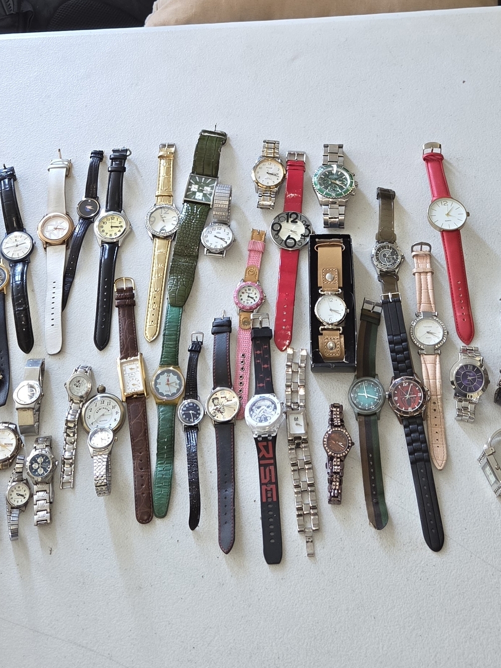 Lot of men's and women's watches. They are all pre-owned